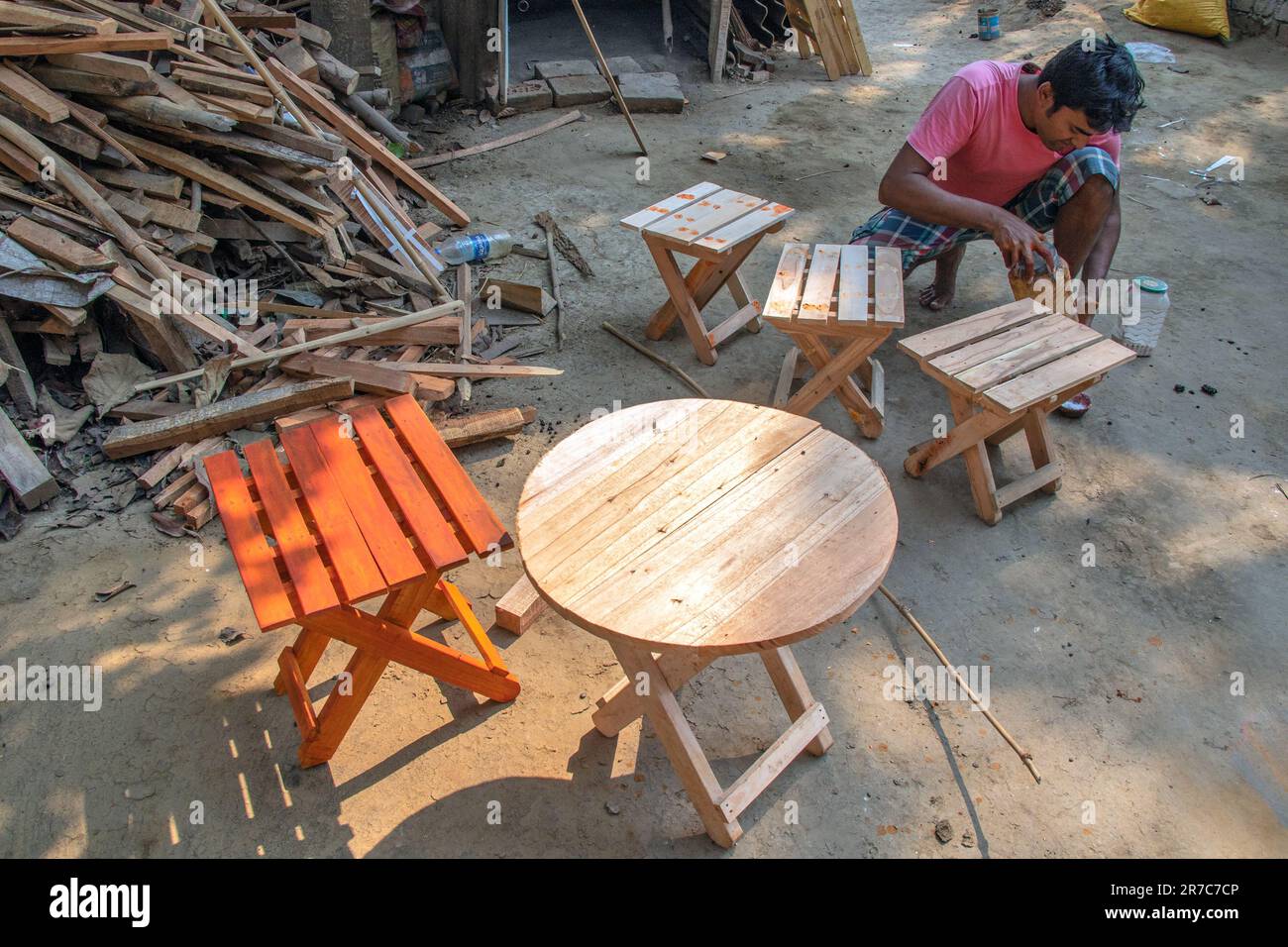 image of wooden doll making process and finished product Stock Photo Alamy