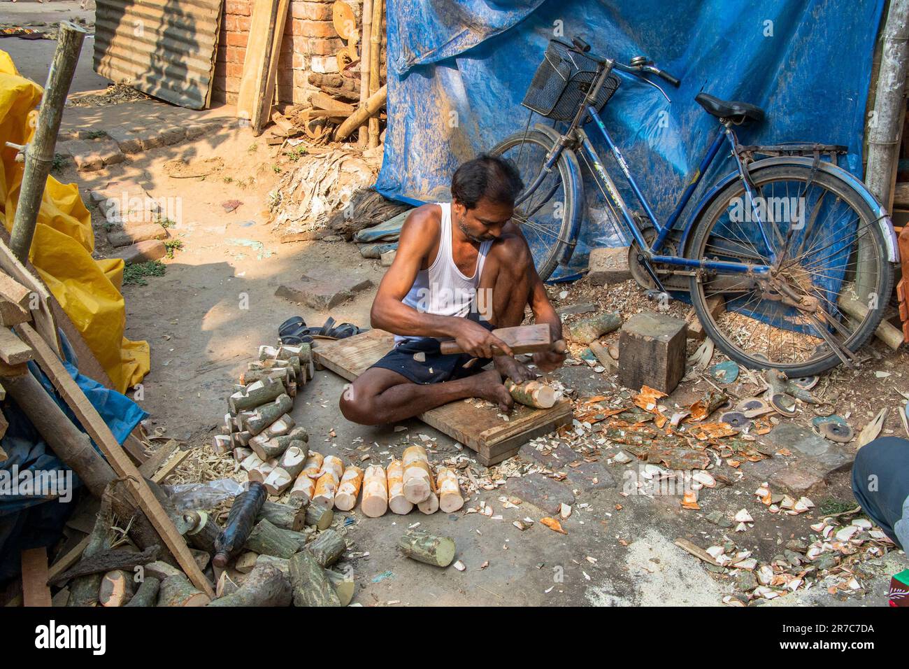 image of wooden doll making process and finished product Stock Photo Alamy