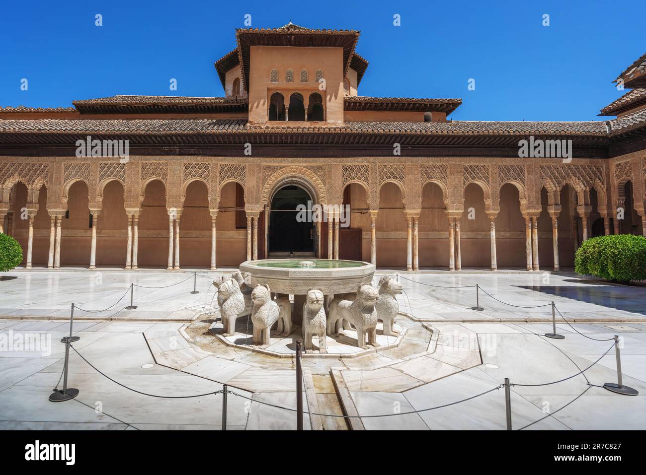 Court of the Lions (Patio de los Leones) with fountain at Nasrid Palaces of Alhambra - Granada, Andalusia, Spain Stock Photo