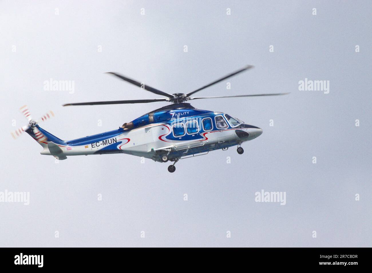 Agusta-Westland AW-139 operated by Helity Copter Airlines captured in the descent phase to land at Ceuta Heliport, Spain. Stock Photo