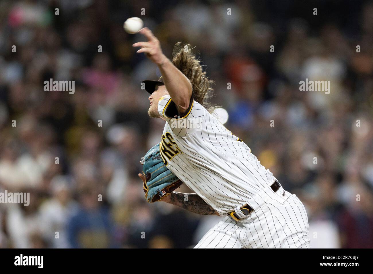 San Diego Padres' Josh Hader delivers a pitch to a Cleveland Guardians