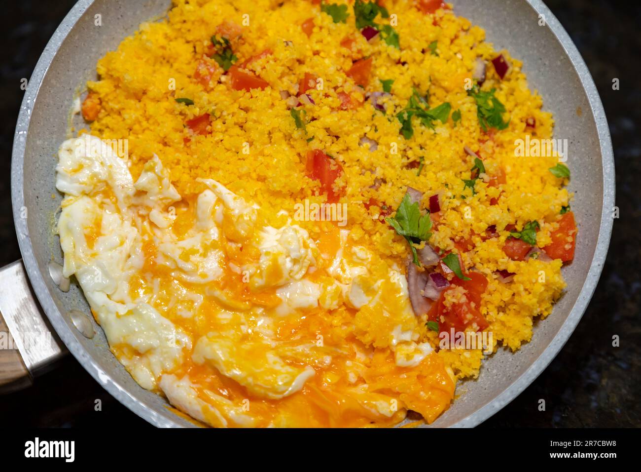 Traditional couscous with egg, typical Brazilian food. Rustic corn