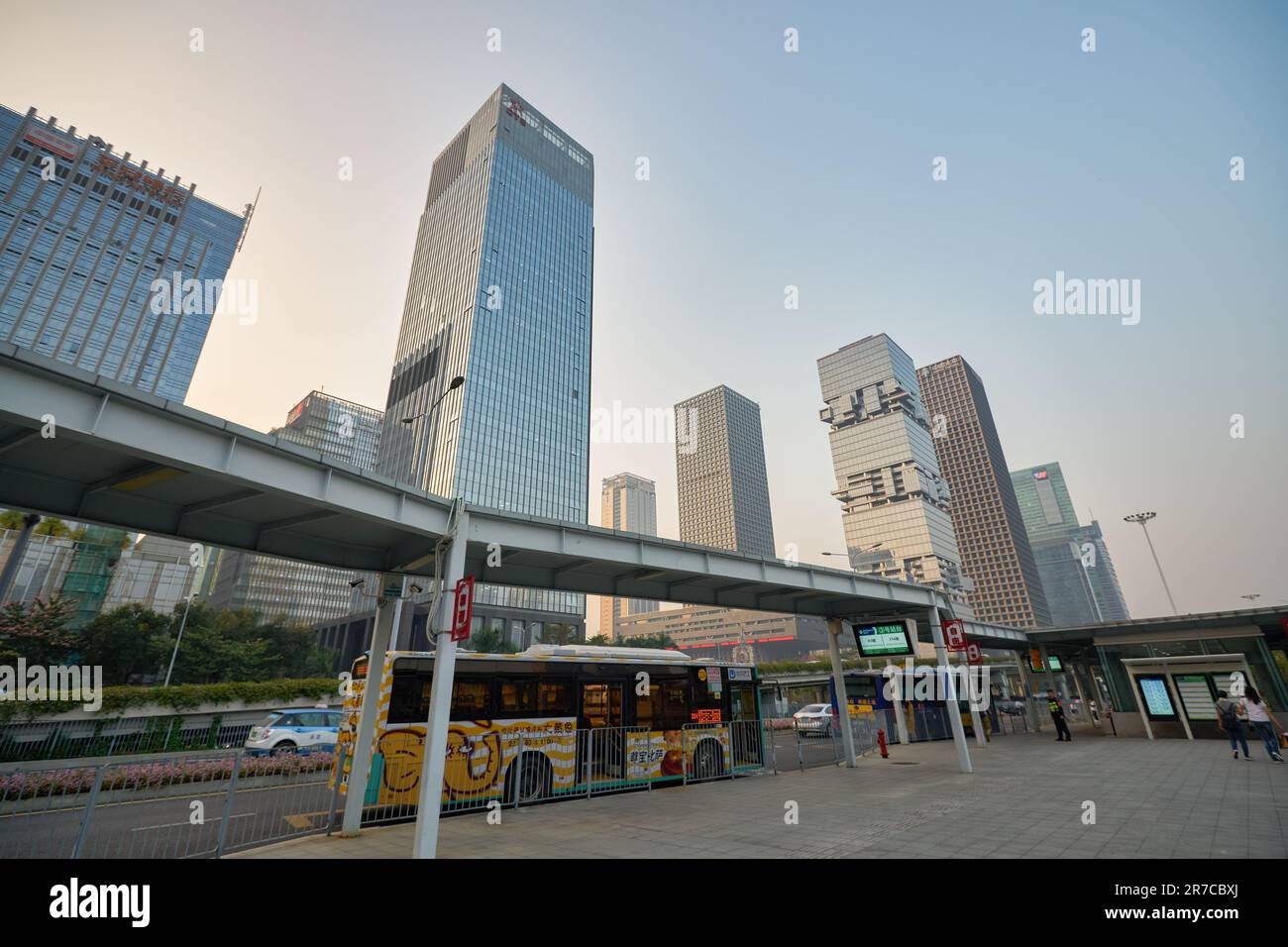 SHENZHEN, CHINA - 27 NOVEMBER, 2019: bus at Futian railway stationin Futian District, Shenzhen in the evening. Stock Photo
