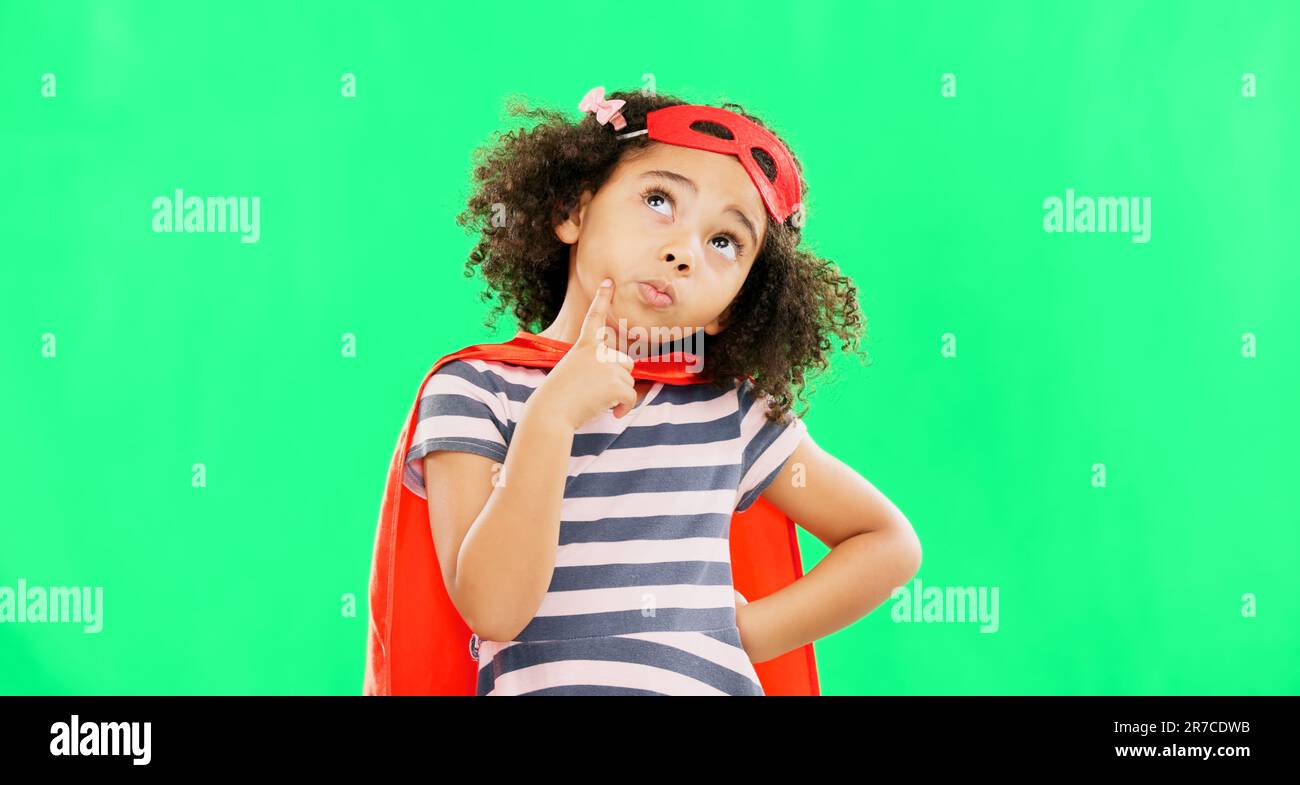Child, superhero and thinking on green screen to stop crime and fight