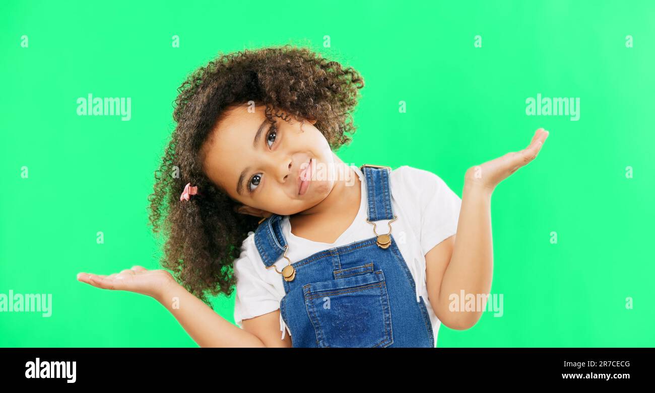 Kids, doubt and a confused girl shrugging her shoulders on a green