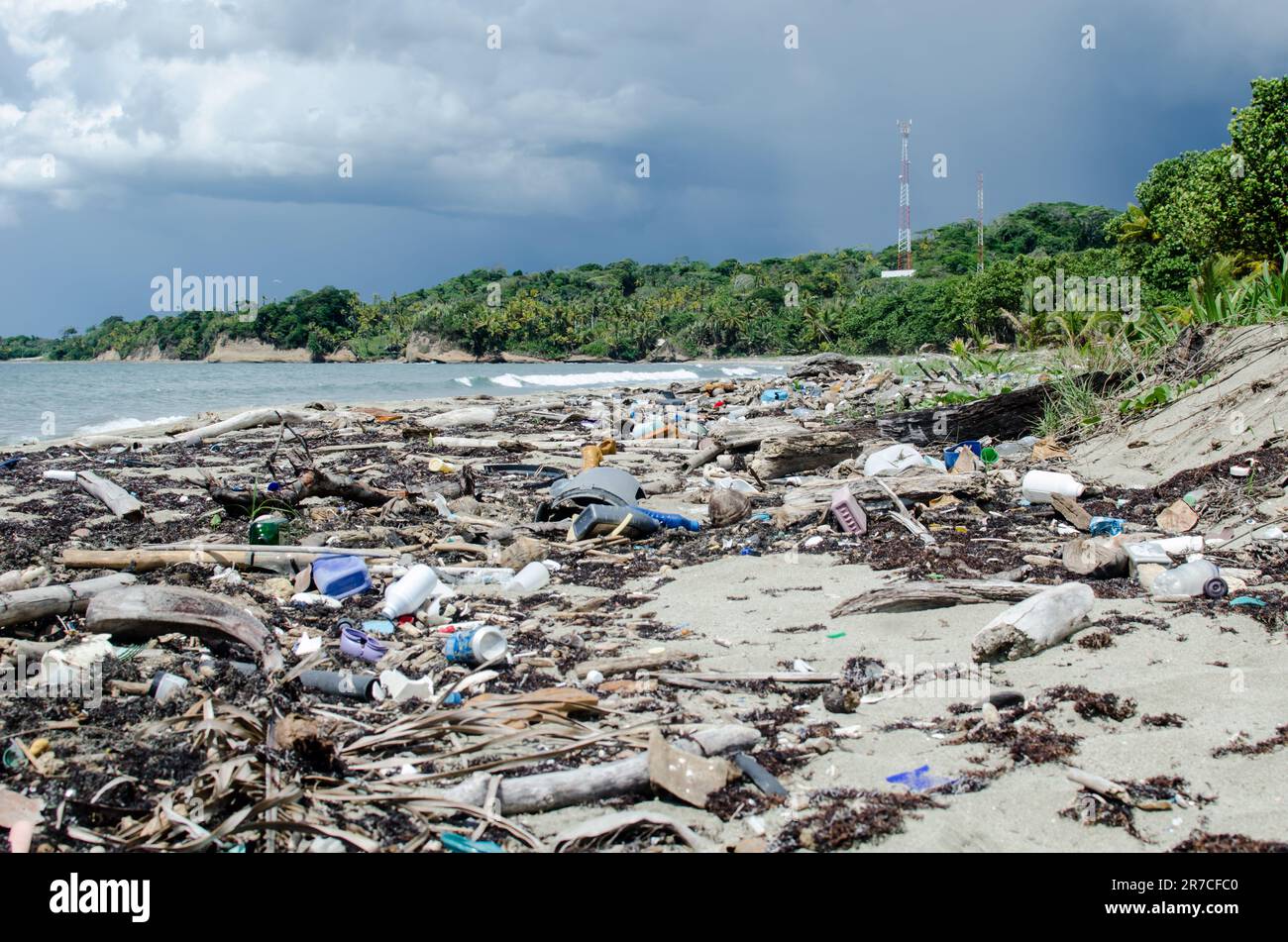 A sparsely visited beach highly contaminated with plastics in the province of Colón, on the Caribbean coast of Panama. Stock Photo