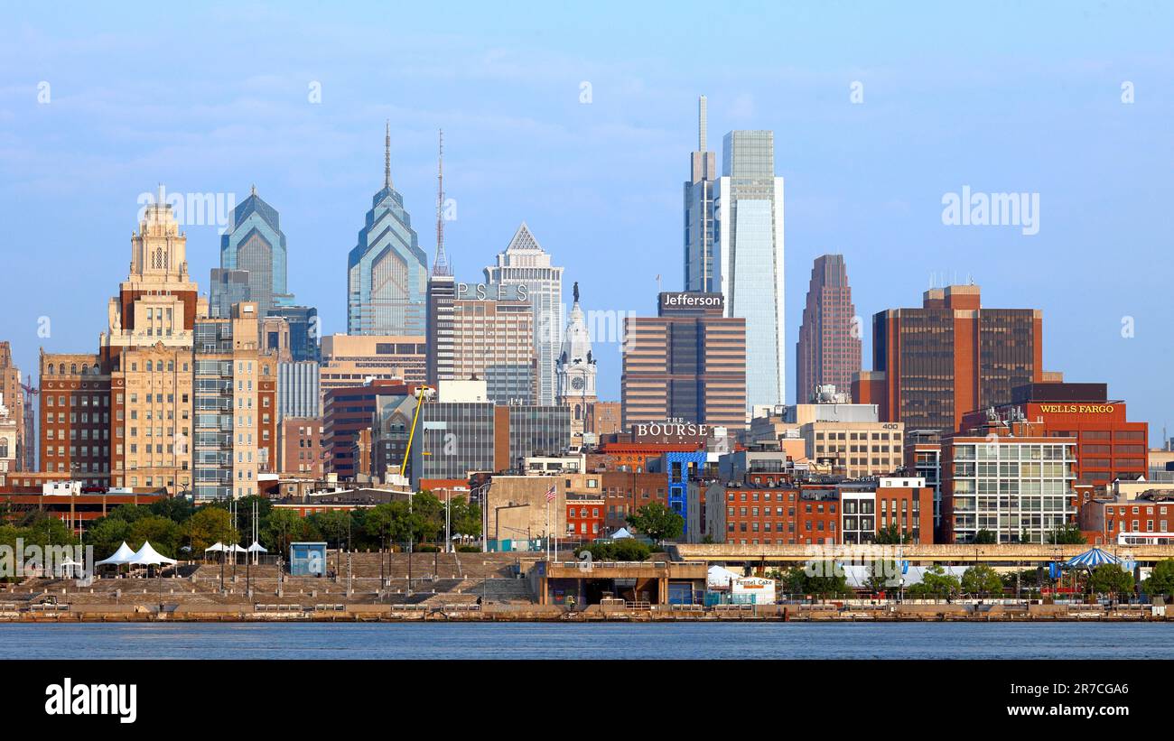 The Philadelphia skyline from the Camden waterfront, June 2023. View of the Bourse, Customs House, City Hall, Jefferson Hospital, PSFS, etc. Stock Photo