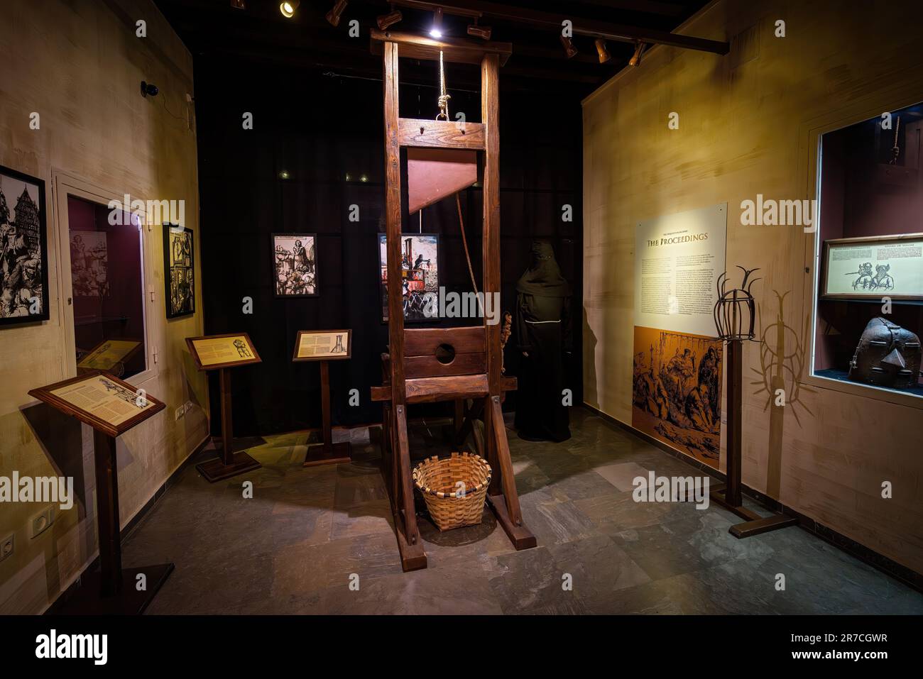 Guillotine at Inquisition Museum in the Palace of the Forgotten (Palacio de los Olvidados) - Granada, Andalusia, Spain Stock Photo