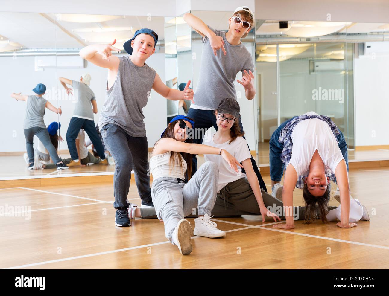 Teens hip hop dancers posing in studio Stock Photo - Alamy