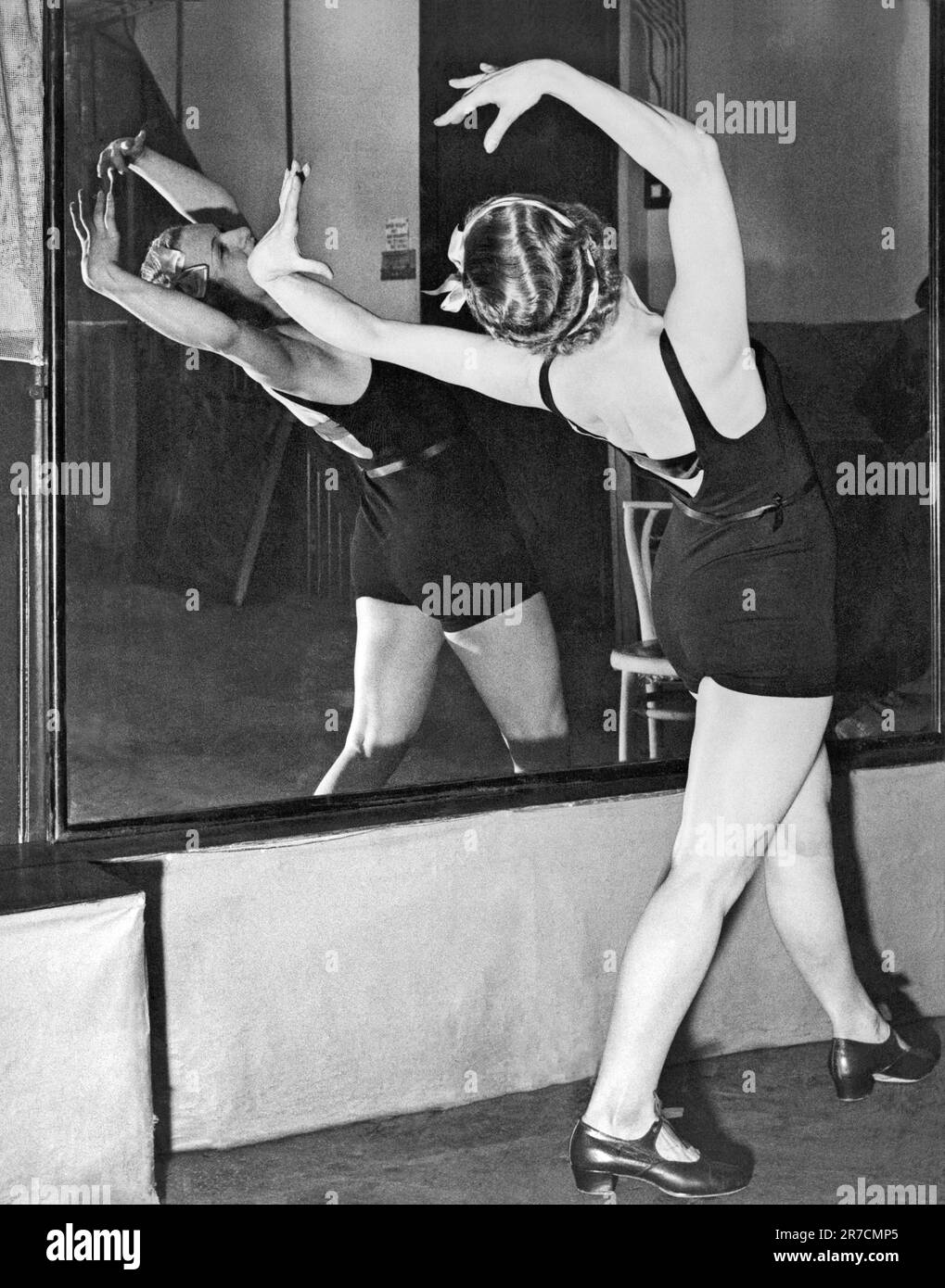 London, England:  c. 1934. Princess Irene Bogdan of Romania training at the London Dance School to make her dancing debut in a forthcoming production. Stock Photo
