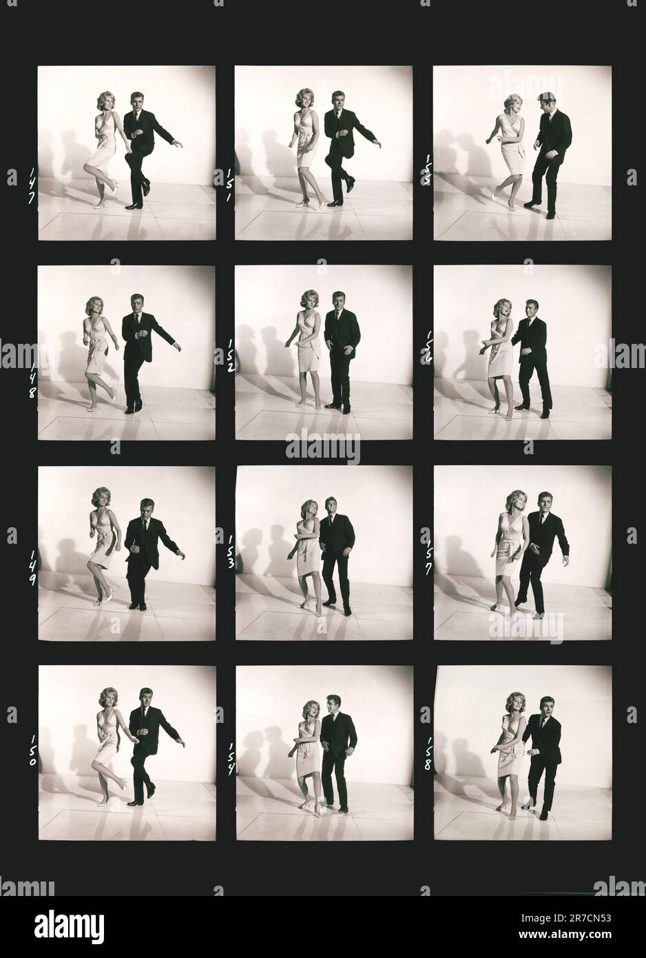 United States:  c. 1961 A proof sheet photograph of a couple demonstrating how to dance the twist. Stock Photo