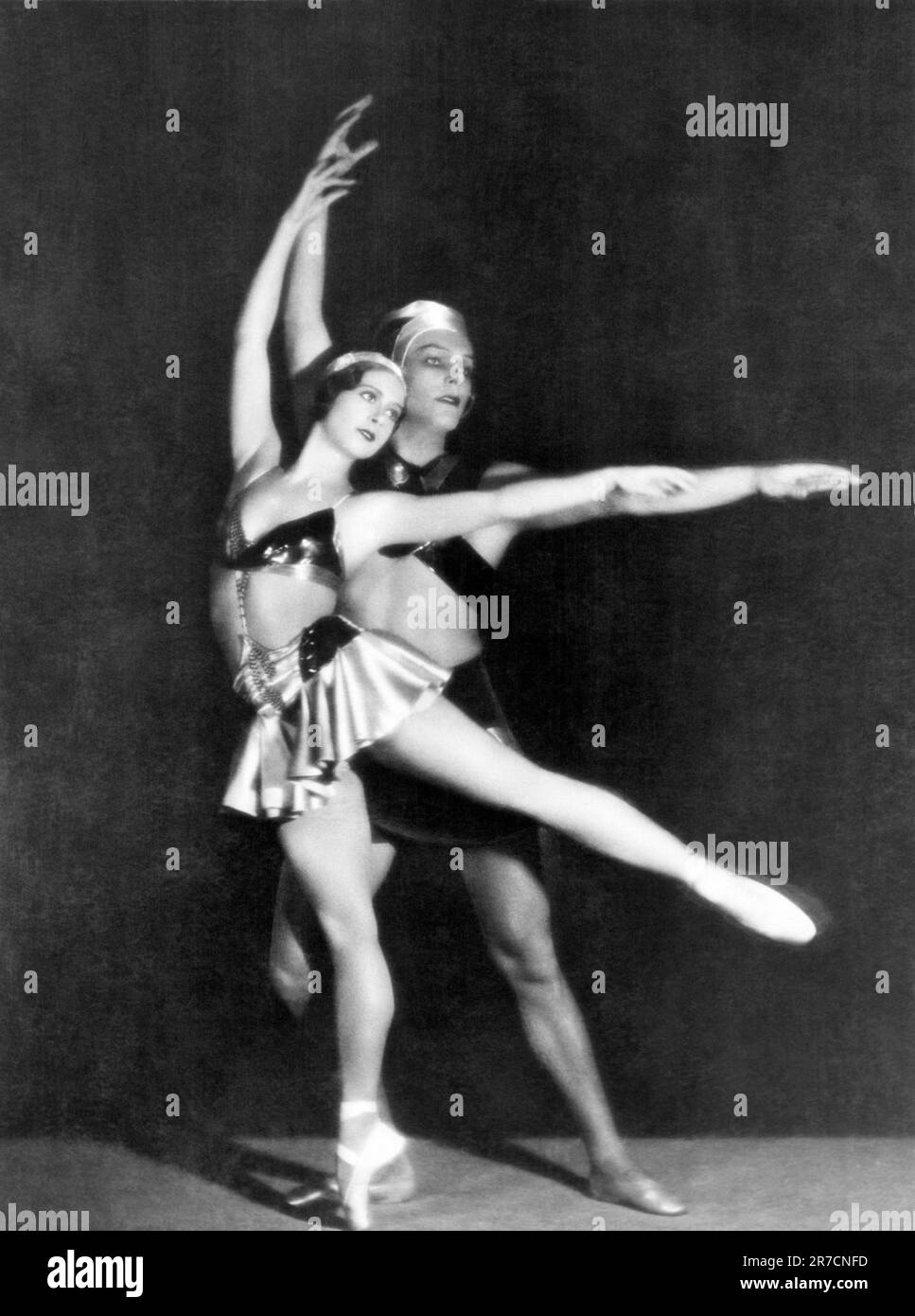 Italy:  September 1, 1935 Two members of the Richter Ballet Company performing a pas de deux on stage. Stock Photo