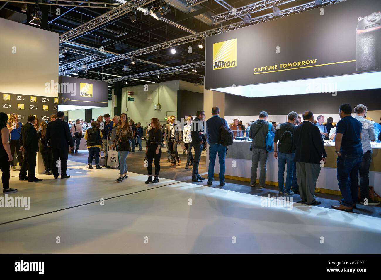 COLOGNE, GERMANY - CIRCA SEPTEMBER, 2018: visitors to try cameras in ...