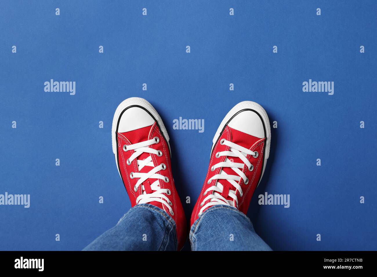Wearing red top and blue jeans hi-res stock photography and images - Alamy