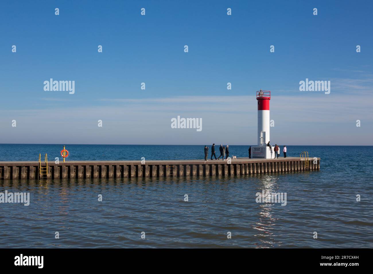 Pier and Lighthouse at Ontario Lake, Oakville Lakeshore Stock Photo