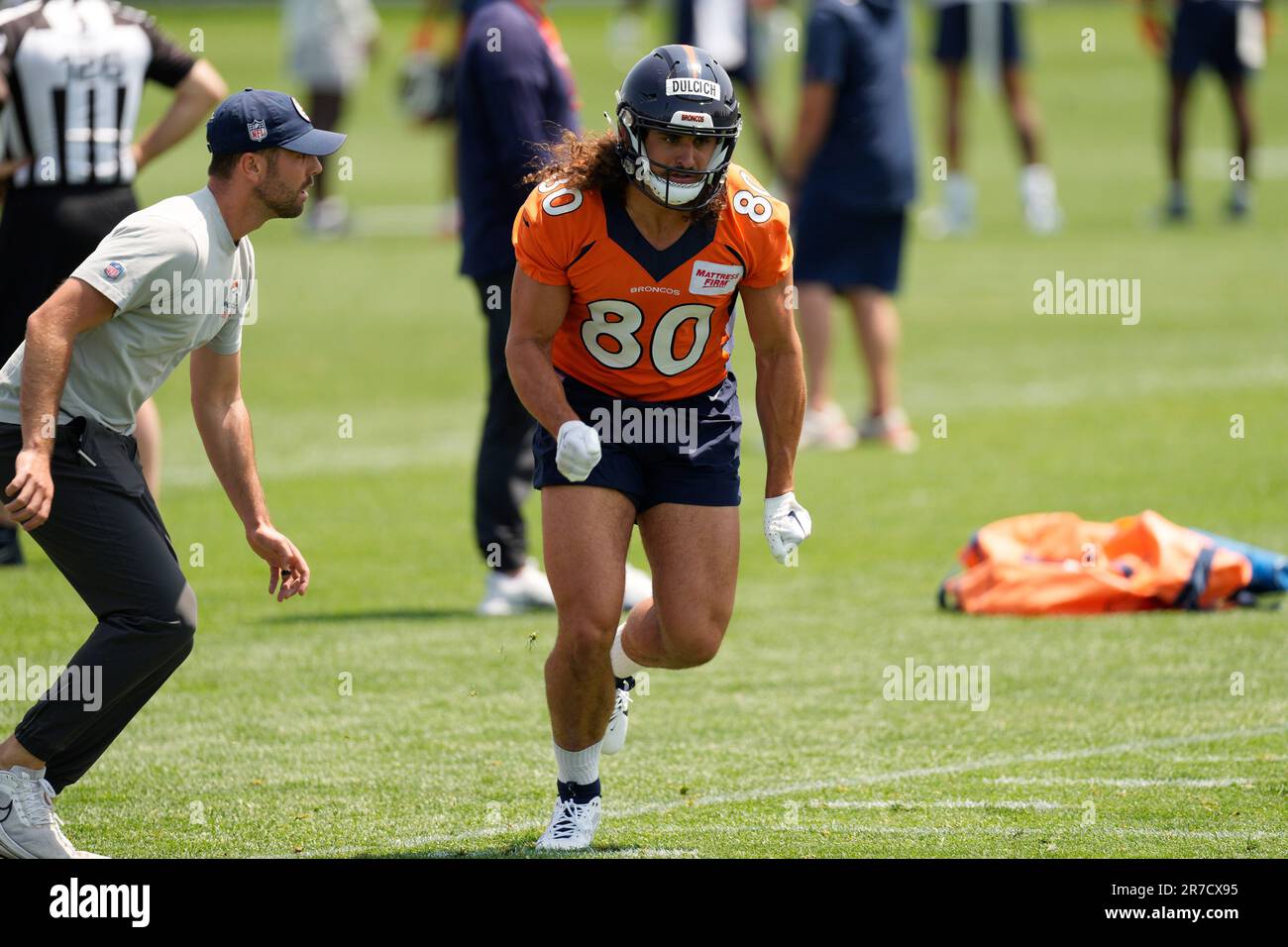 Denver Broncos tight end Greg Dulcich (80) warms up prior to an