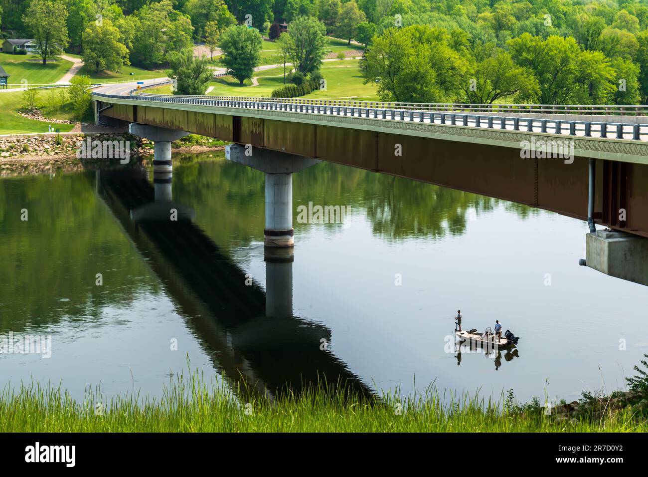 Two men in a bass boat fishing on the Allegheny River under the Hunter