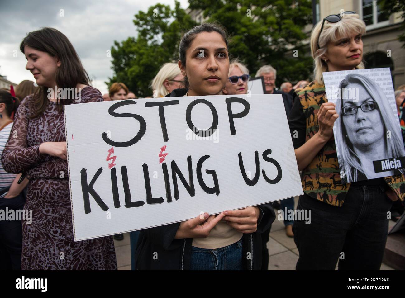 Warsaw, Poland, 14/06/2023, A woman holds a placard that reads "Stop