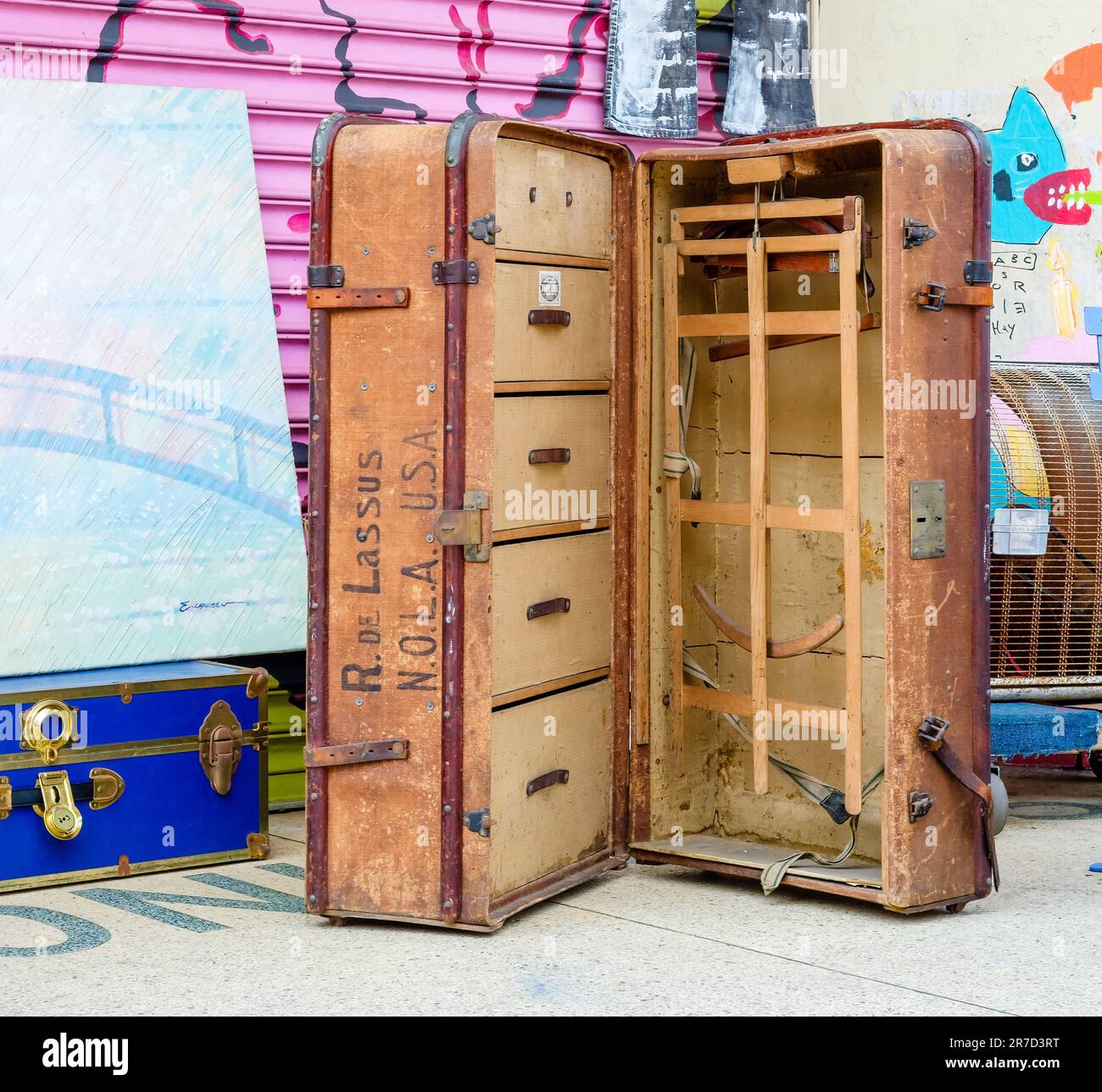NEW ORLEANS, LA, USA - JUNE 10, 2023: Open antique suitcase on display at flea market Stock Photo