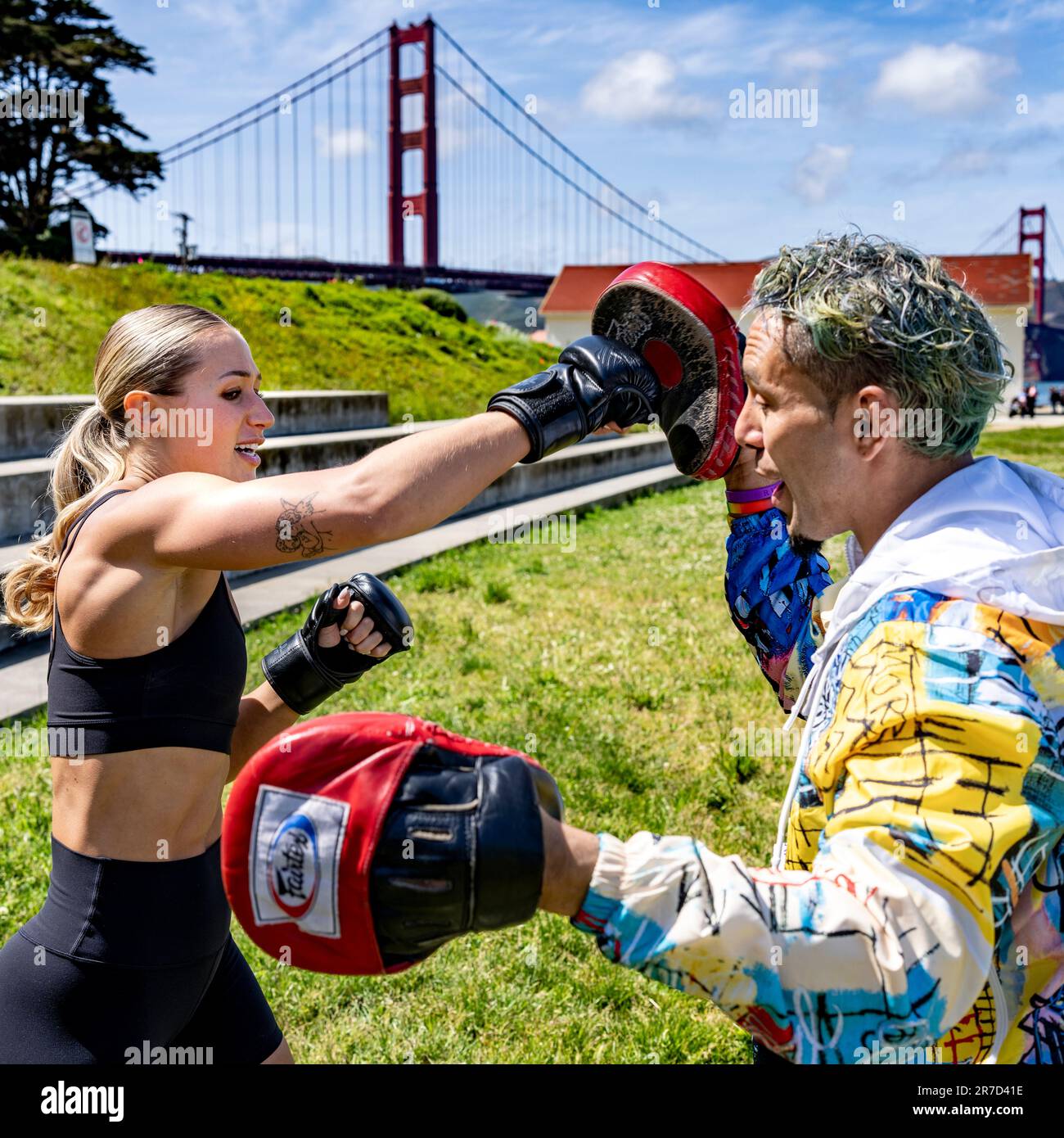 Young Fit Woman Training for MMA Near the San Francisco Golden Gate Bridge Stock Photo