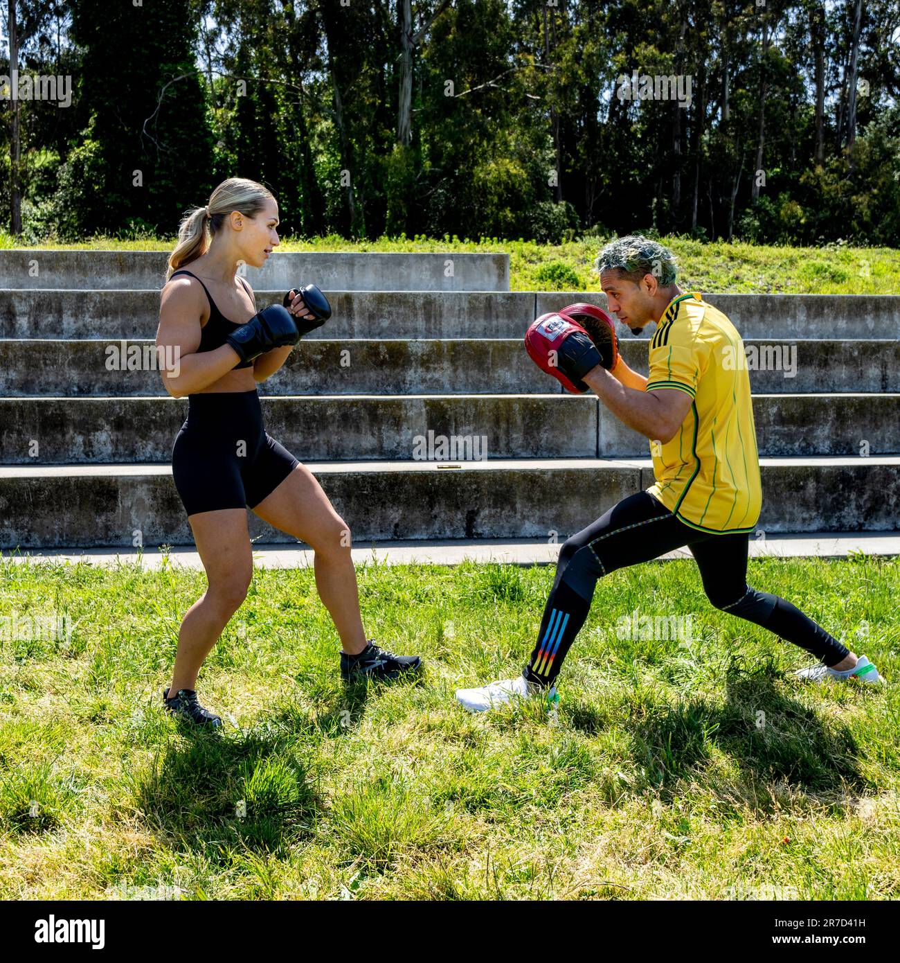 Young Fit Woman Training for MMA Near the San Francisco Golden Gate Bridge Stock Photo