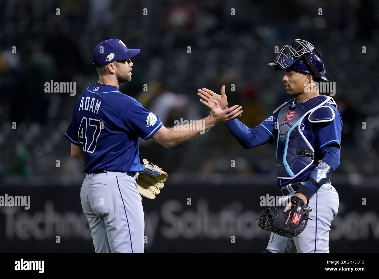 Tampa Bay Rays pitcher Jason Adam, left, and catcher Christian