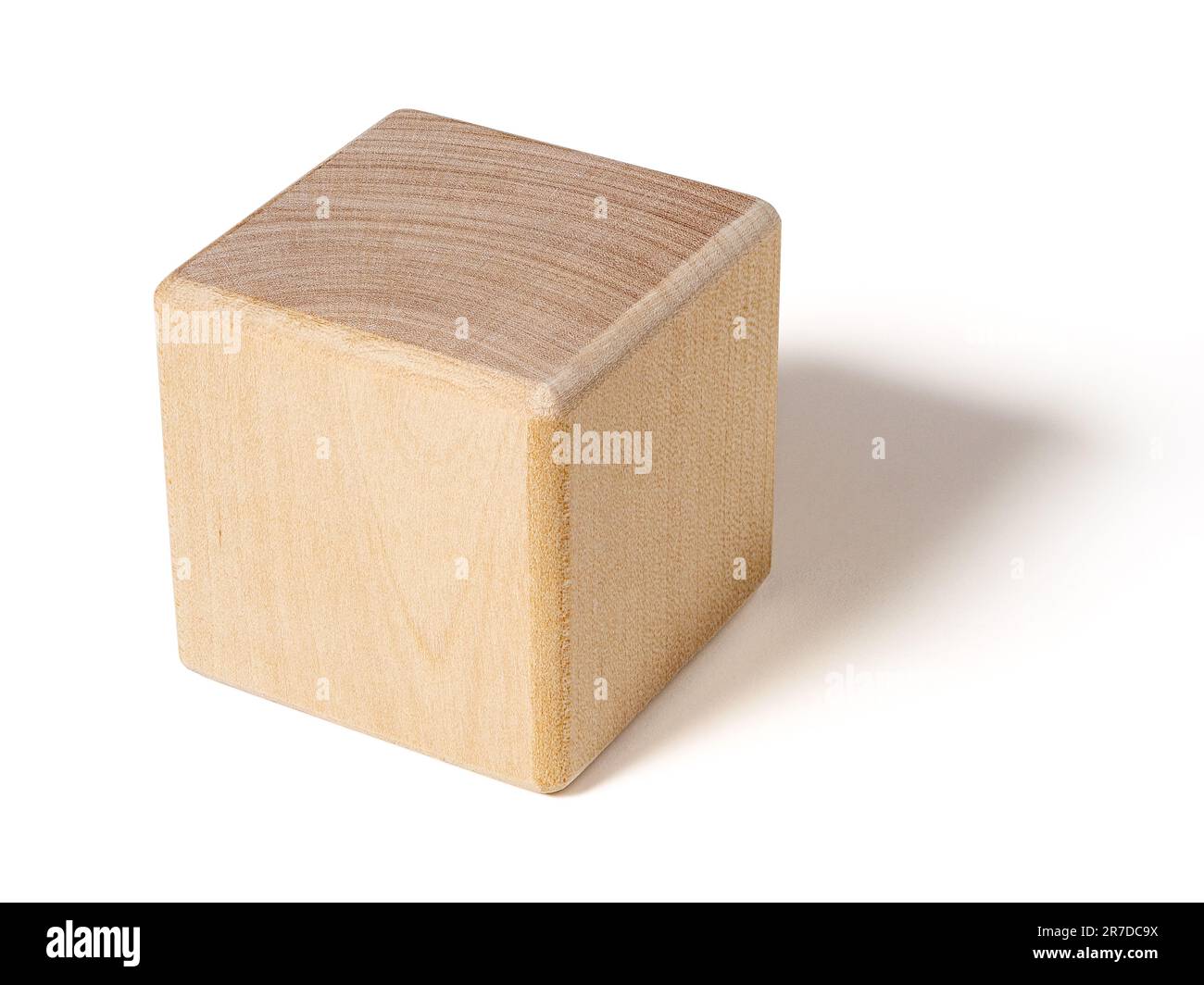 Wooden toy as square wood block with shadow isolated on white Stock Photo