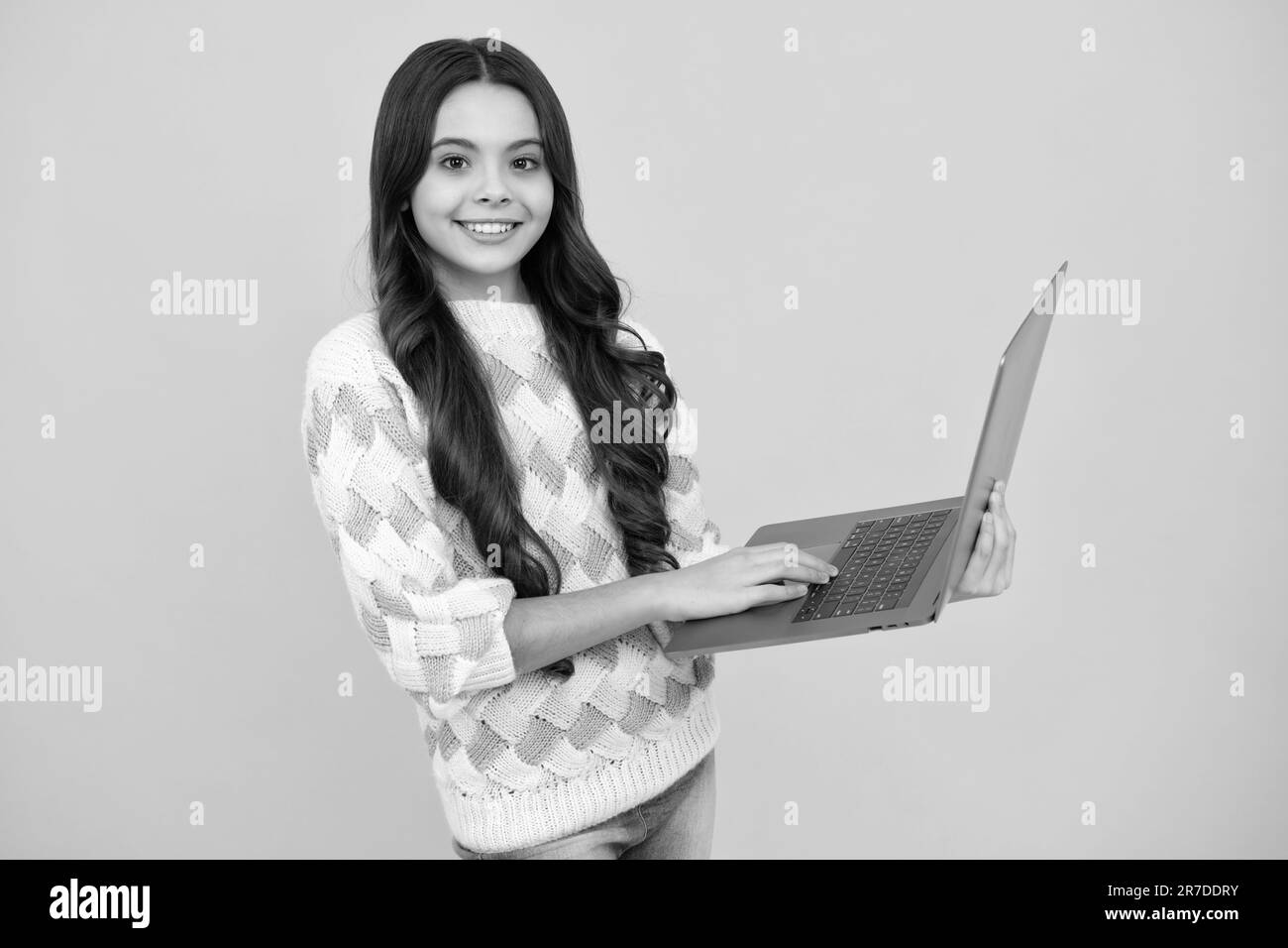 School student using laptop. Elearning and online education. Teen girl