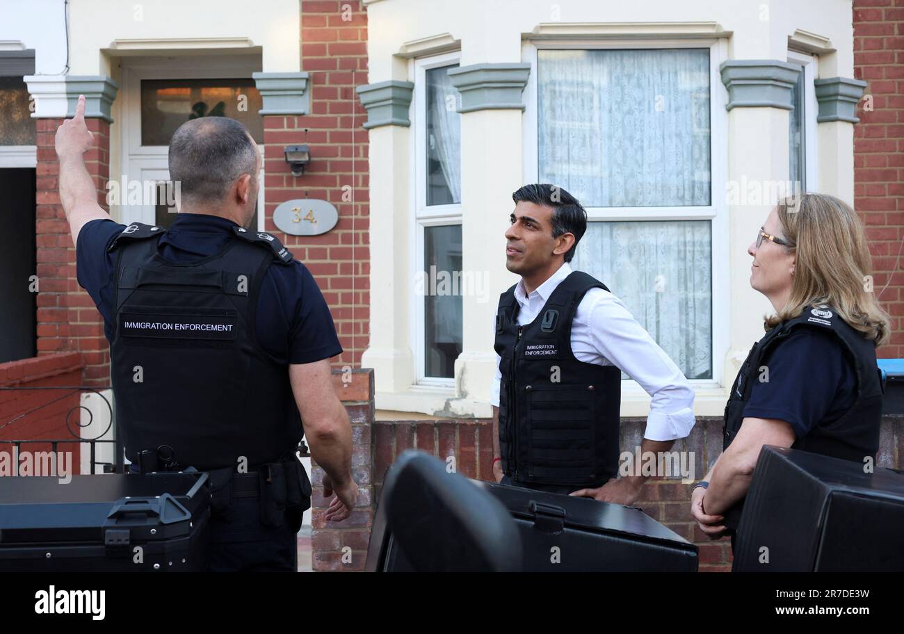 Prime Minister Rishi Sunak watches an immigration raid in north west ...