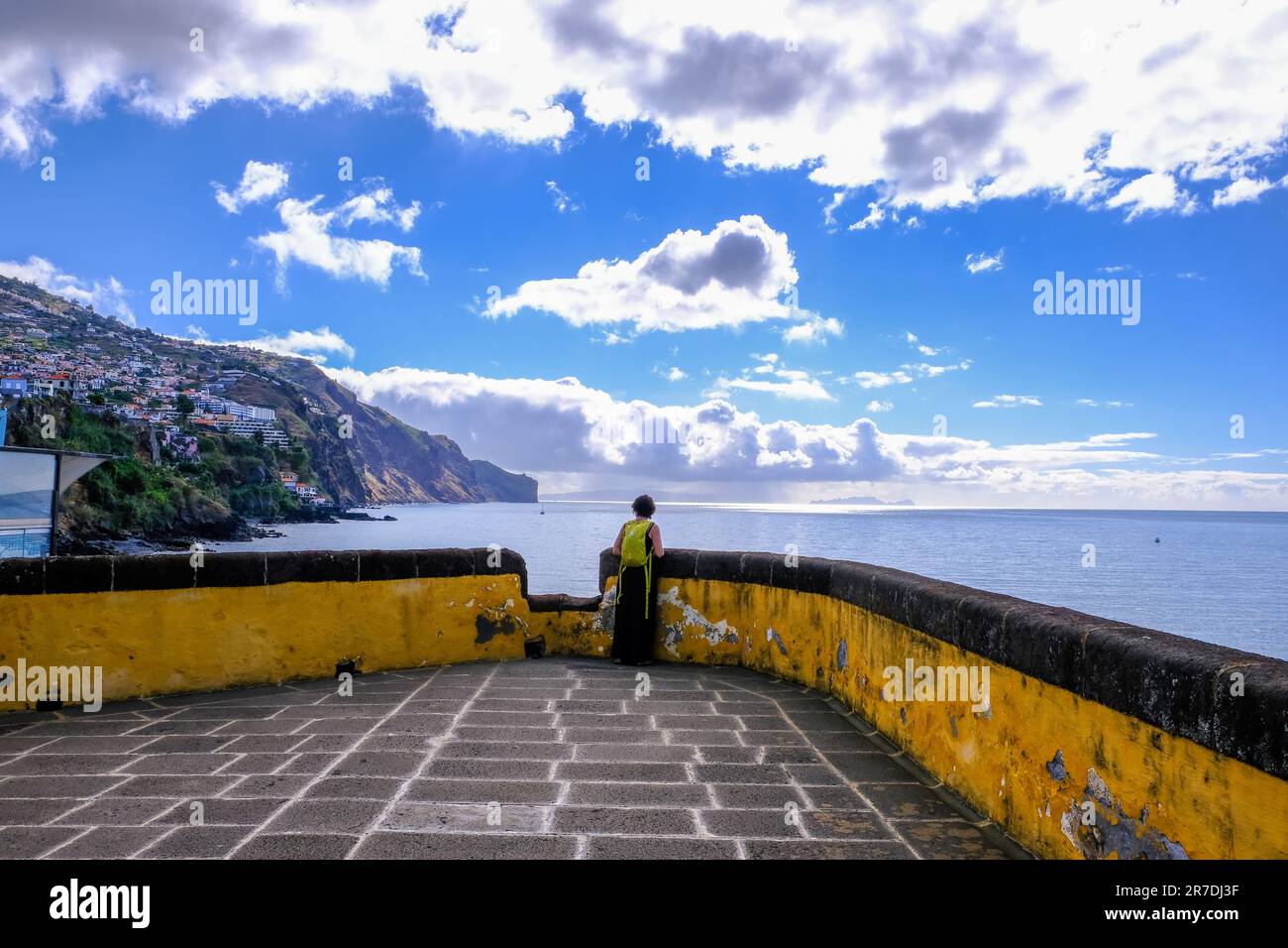 Tourist looking the ocean from the Santiago Fort, Sao Tiago, in Funchal, Madeira Island, Portugal Stock Photo