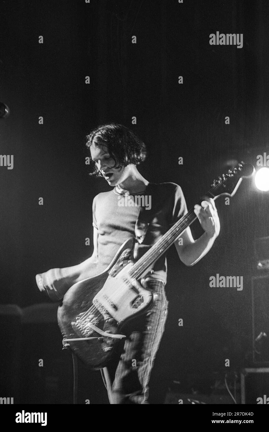 BRIAN MOLKO, PLACEBO, 1997: Brian Molko of the band Placebo plays at Cardiff University touring their debut album Bruise Pristine in Cardiff, Wales on 6 February, 1997. Photograph: Rob Watkins.  INFO: Placebo is a British rock band formed in 1994, known for their androgynous image and distinctive sound blending alternative rock and glam influences. Led by Brian Molko, they gained fame with hits like 'Nancy Boy' and 'Every You Every Me.' Stock Photo