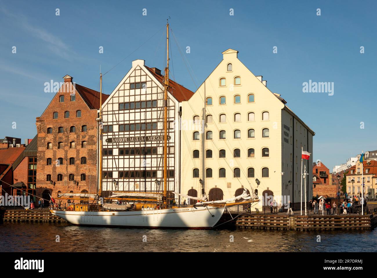 National Maritime Museum by the Motlava River in the Old Town of Gdansk, Poland Stock Photo
