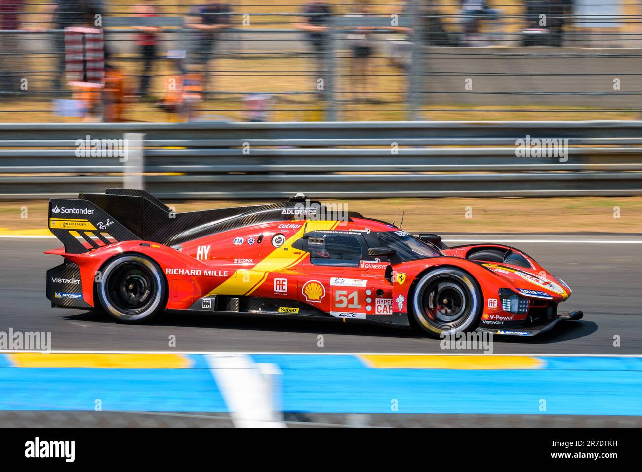 The Ferrari 499P Hypercar race car No. 51, from the AF Corse team, on the Circuit de la Sarthe race track during the 24 hours of Le Mans. Stock Photo