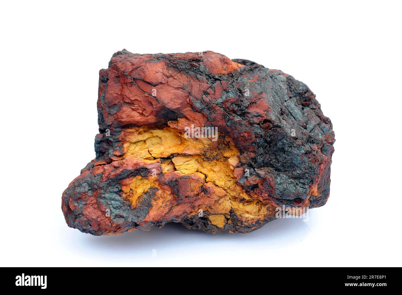 Hematite and limonite. Hematite or haematite is a mineral composed by iron oxide; limonite are formed by iron hidroxide. Both are iron ore. The sample Stock Photo