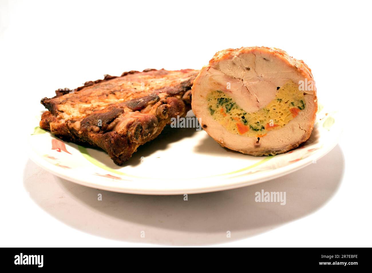 A closeup of a delicious grilled meat on a white background Stock Photo