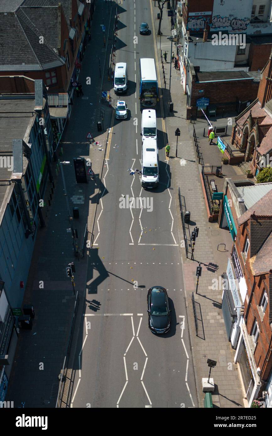 High Street, Kings Heath, Birmingham 15th June 2023 A woman and child