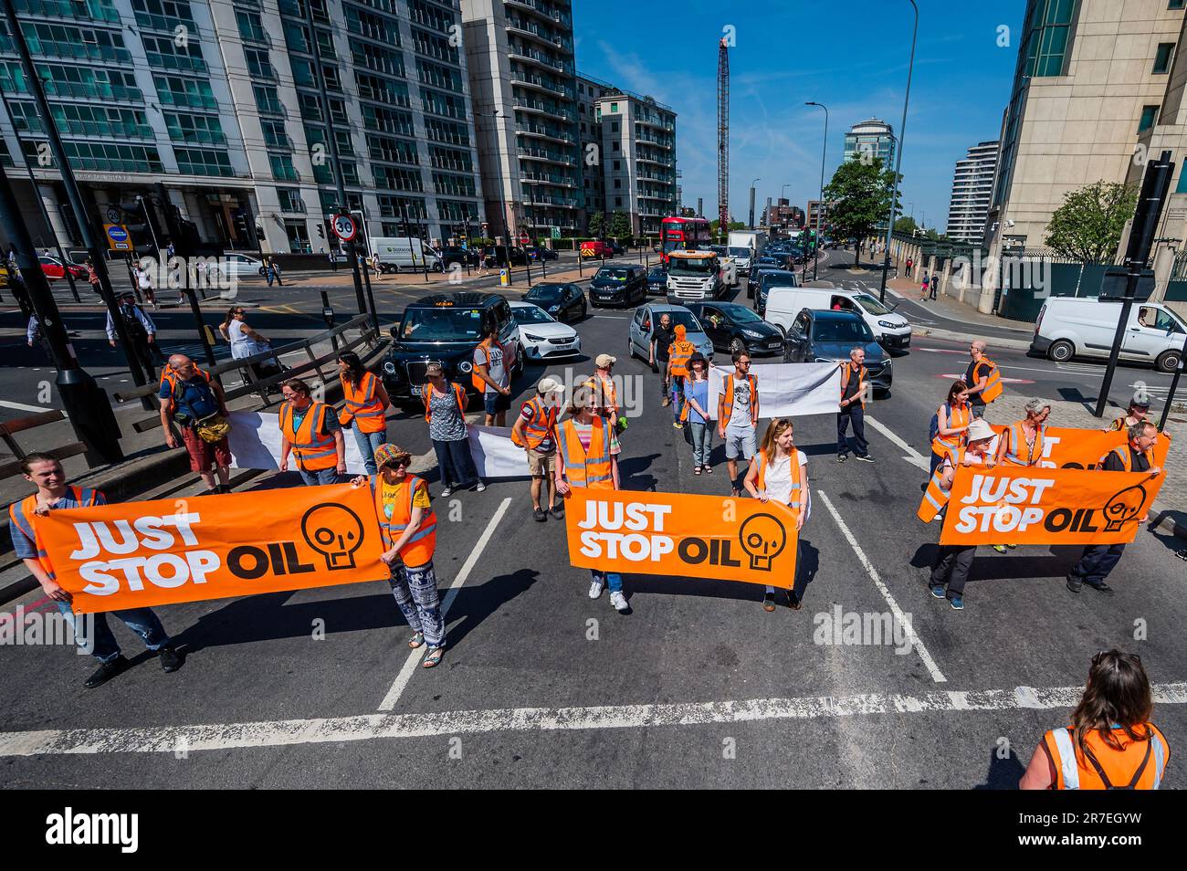 London, UK. 15th June, 2023. Just stop oil protest at Vauxhall Cross on the day that new powers have been given to the police to stop slow walking protests. The group's overall aim is to get the Government to stop all new oil fields. as part of the effort to try to avoid the climate crisis. Credit: Guy Bell/Alamy Live News Stock Photo