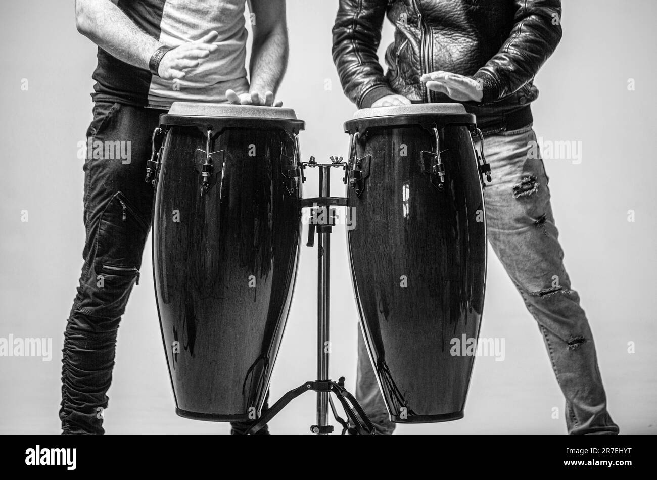 Hands, bongs. Close up of musician hand playing bongos drums. AfroCuba