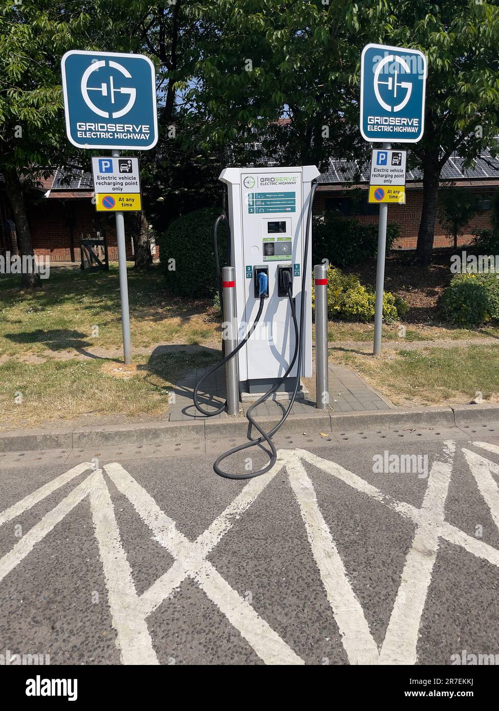 Westerham, Kent, England, UK. 2023. Electric vehicle battery charging points in a service station parking area in Kent, UK. Stock Photo