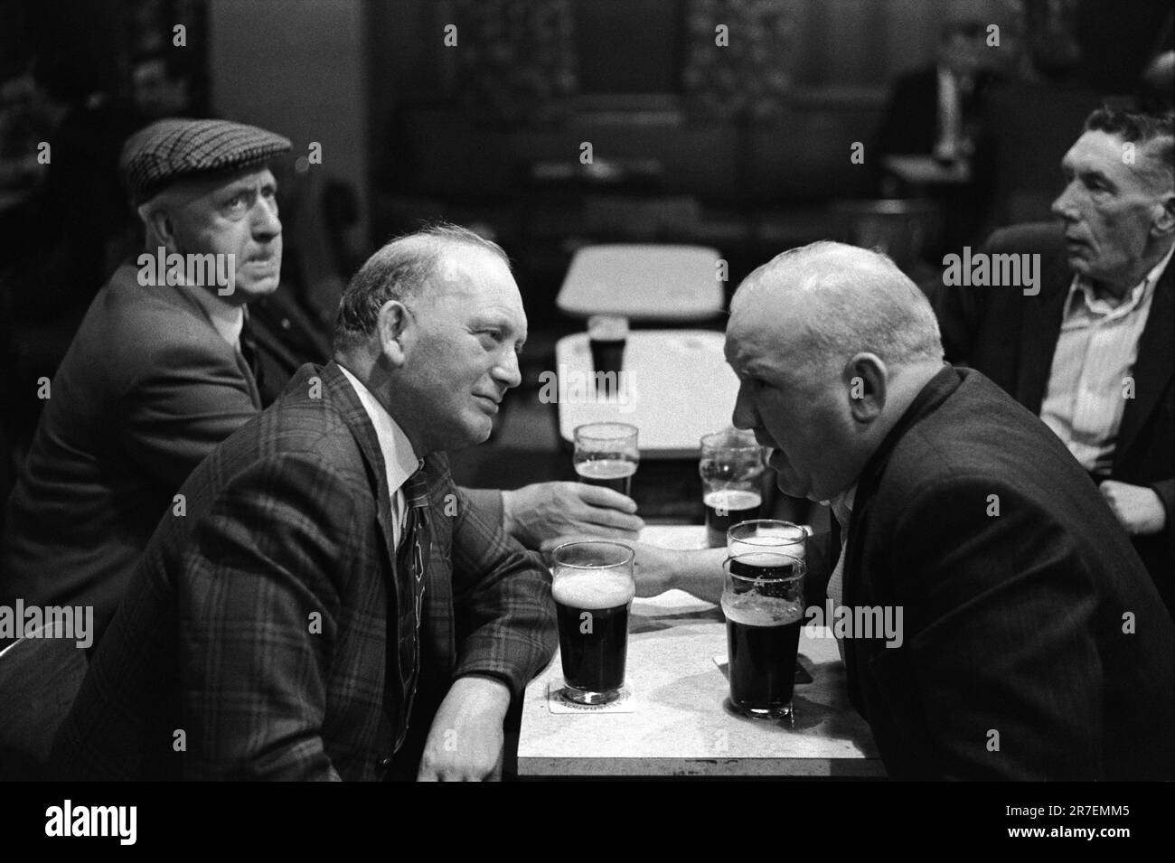 Pints of beer. Saturday night at Byker and St Peters Working Men's Club, Newcastle upon Tyne, Tyne and Wear, northern England circa 1973. 1970S UK HOMER SYKES Stock Photo