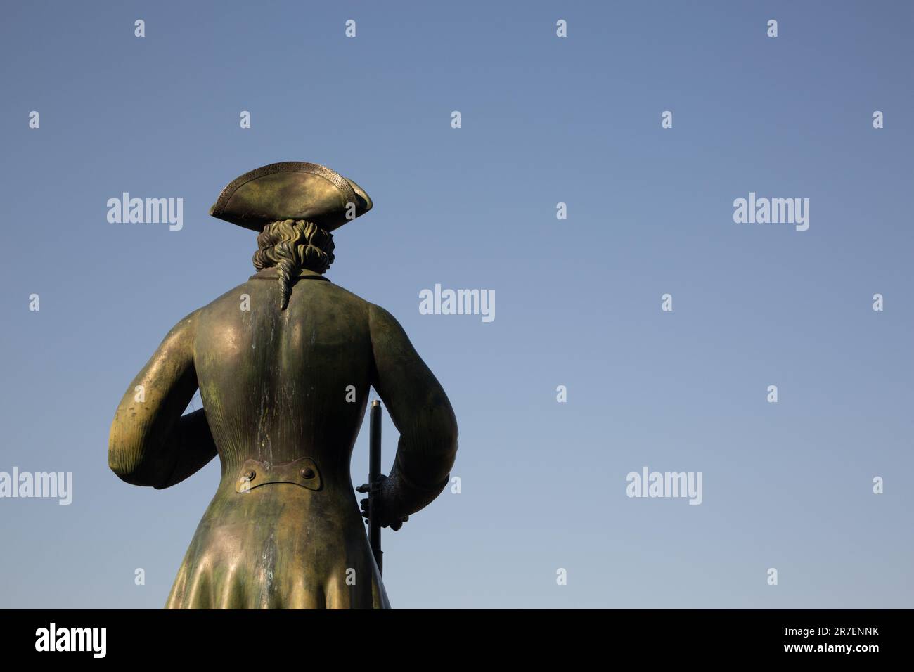 The statue of Peter the Great, dressed in 17th century naval garb, Greenwich, London. Shown from the rear against a blue sky. Landscape orientation Stock Photo