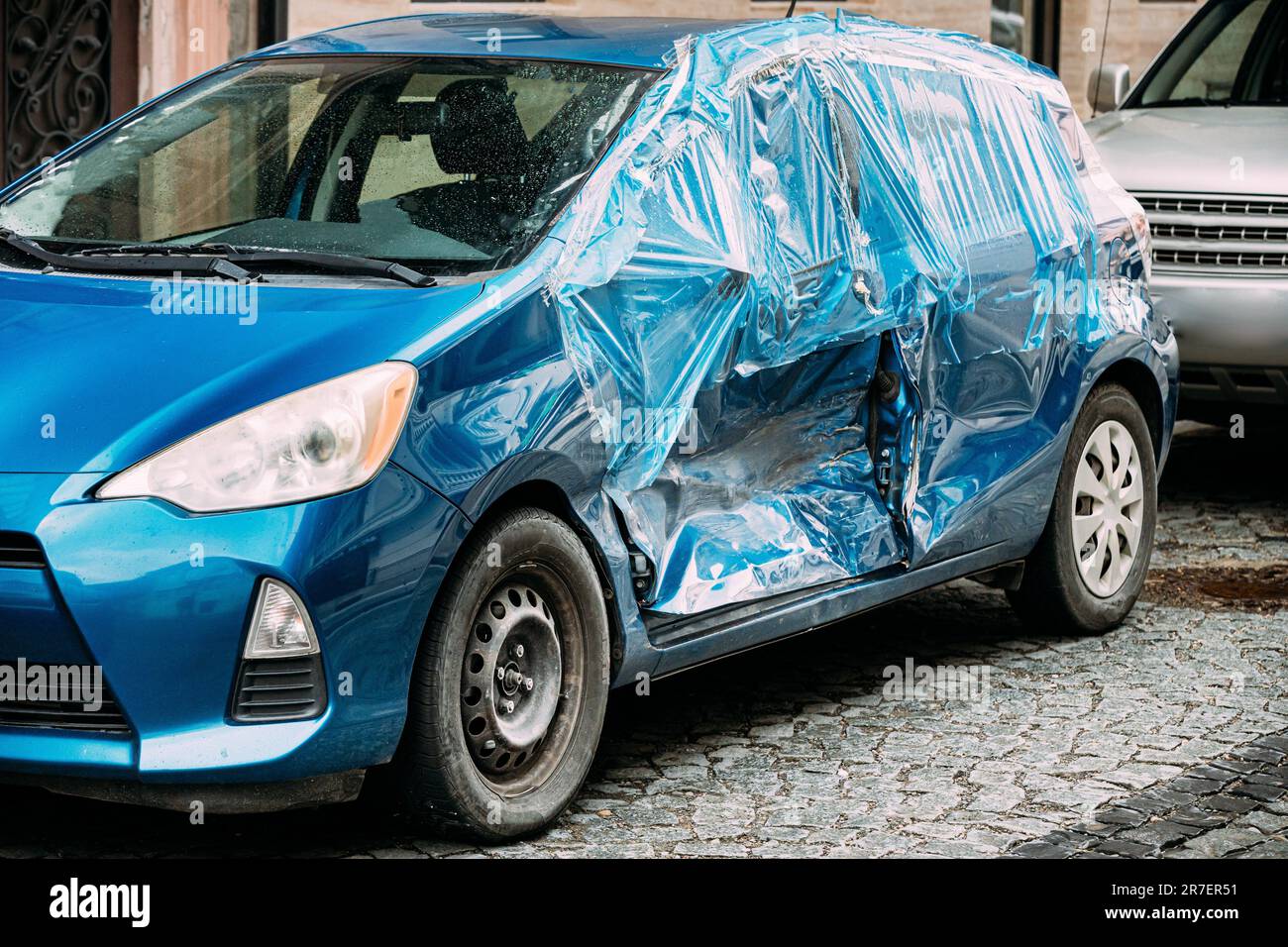 Broken Scratched And Dent Doors Side Fender blue Car after Collision