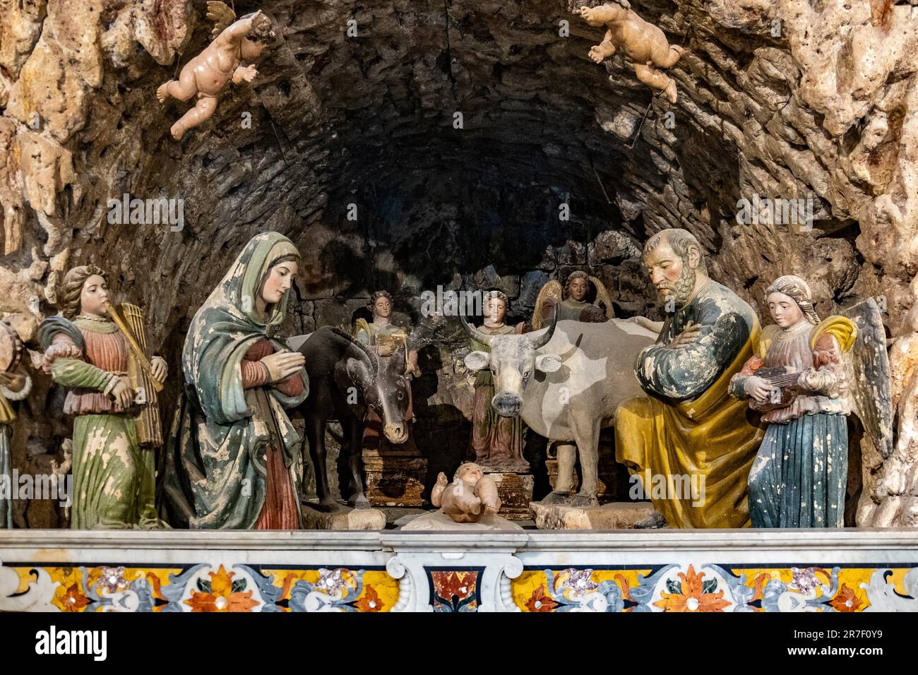 Old nativity scene in the cathedral of ancient town 'Sassi di Matera' in  Matera, Puglia, Italy. The Cathedral or the Duomo was built in 1268 and is  Stock Photo - Alamy