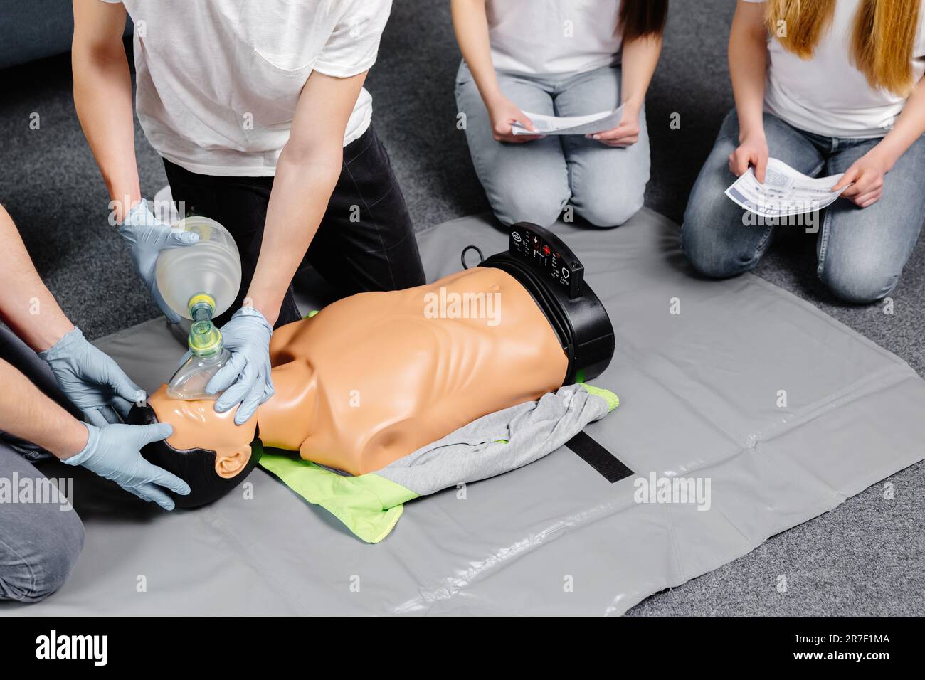 First Aid Training - Cardiopulmonary resuscitation. First aid course on cpr dummy Stock Photo