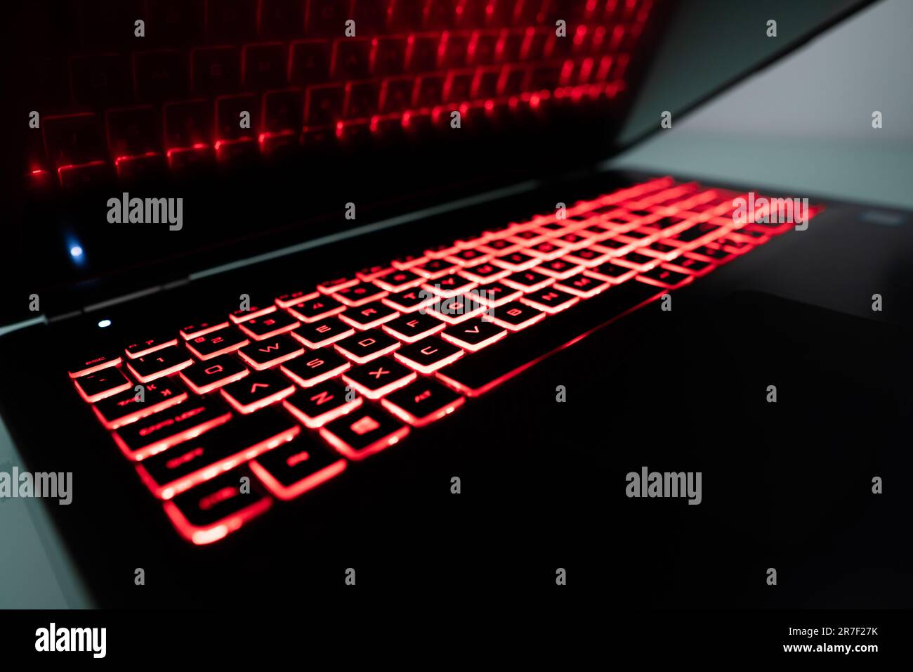 Gaming laptop keyboard with led red light Stock Photo - Alamy