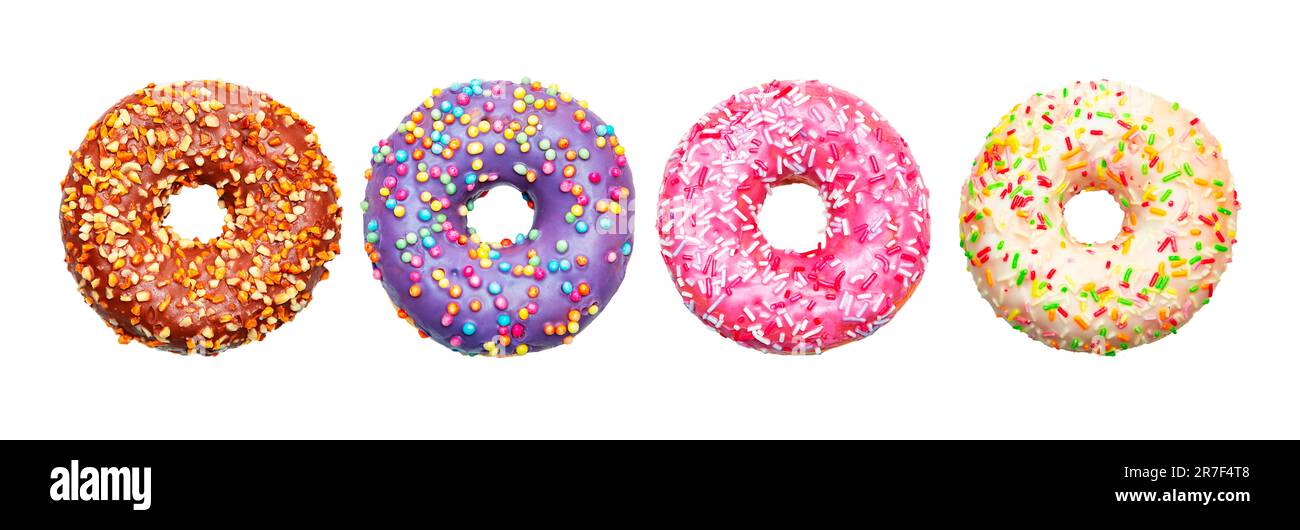 Assorted donuts with colorful icing. Isolated on white background. Stock Photo