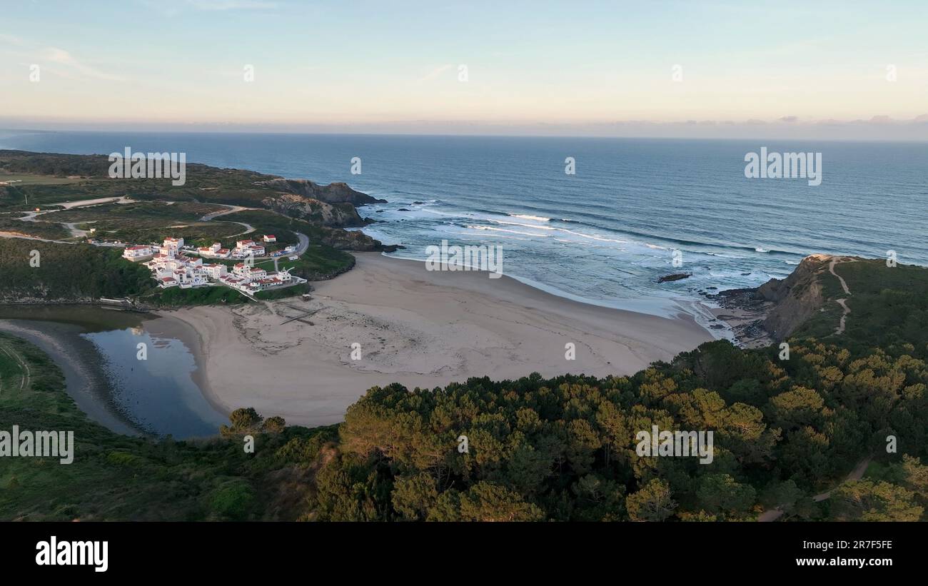 Aerial view of Praia de Odeceixe along Ribeira de Seixe river, Odeceixe