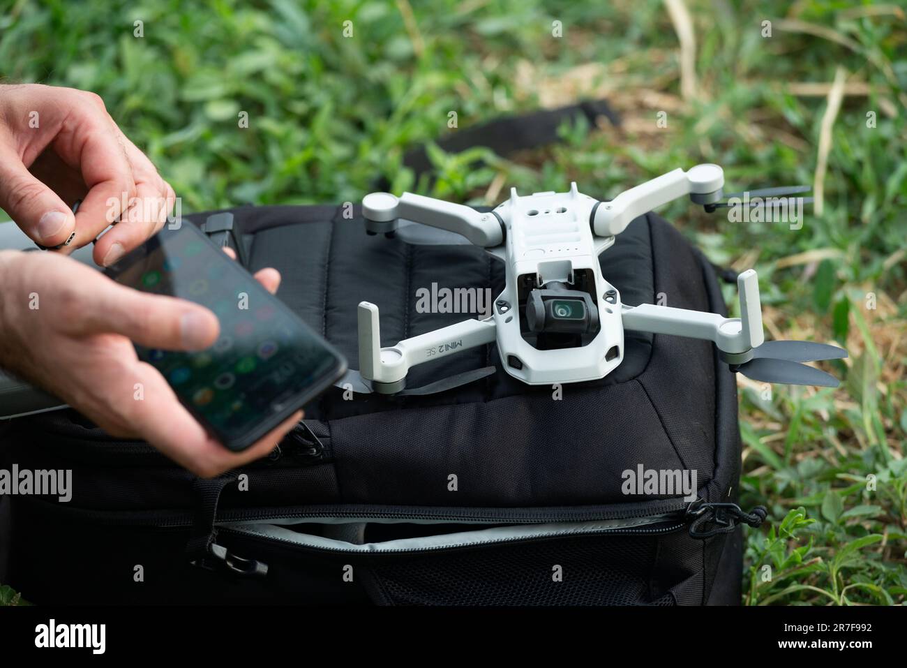 Man Checking a Drone Stock Photo