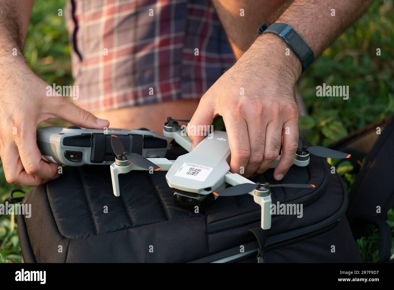 Man Checking a Drone Stock Photo