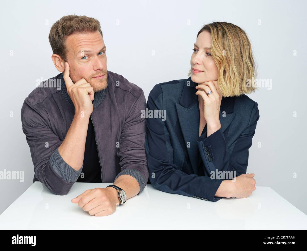 Sam Heughan, left, and Caitriona Balfe pose for a portrait to promote